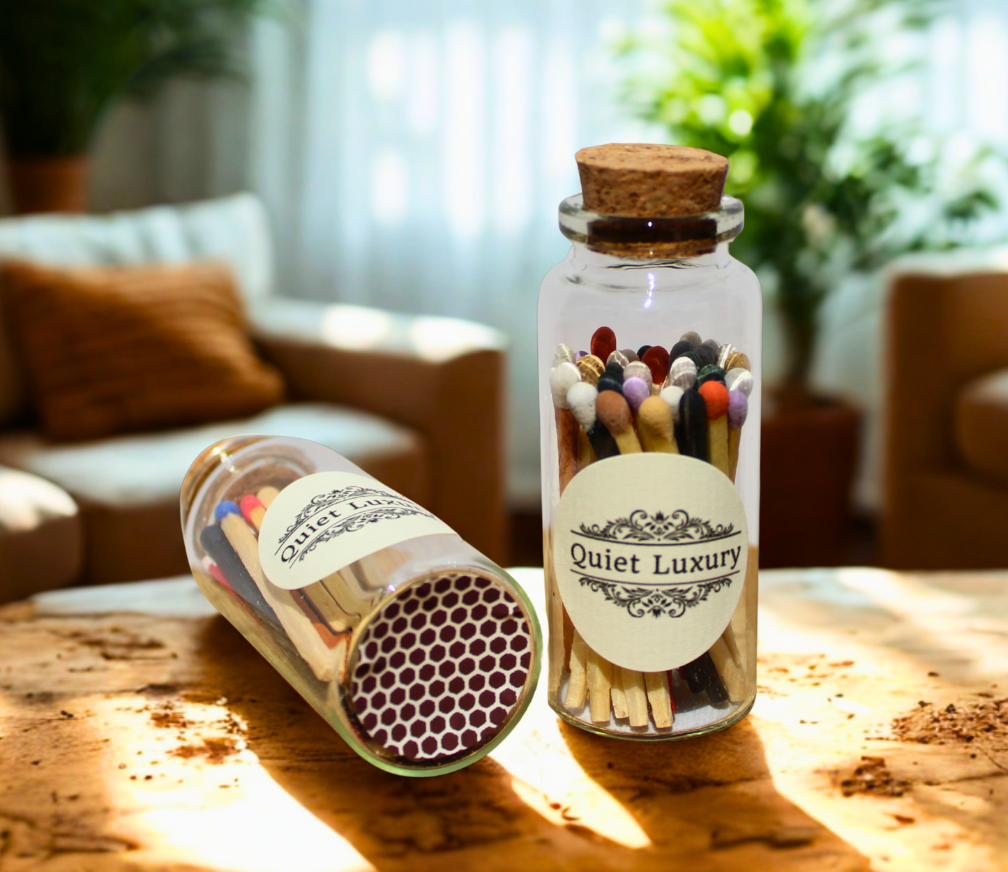 Two glass bottles with cork lids containing colorful matches on a wooden surface.