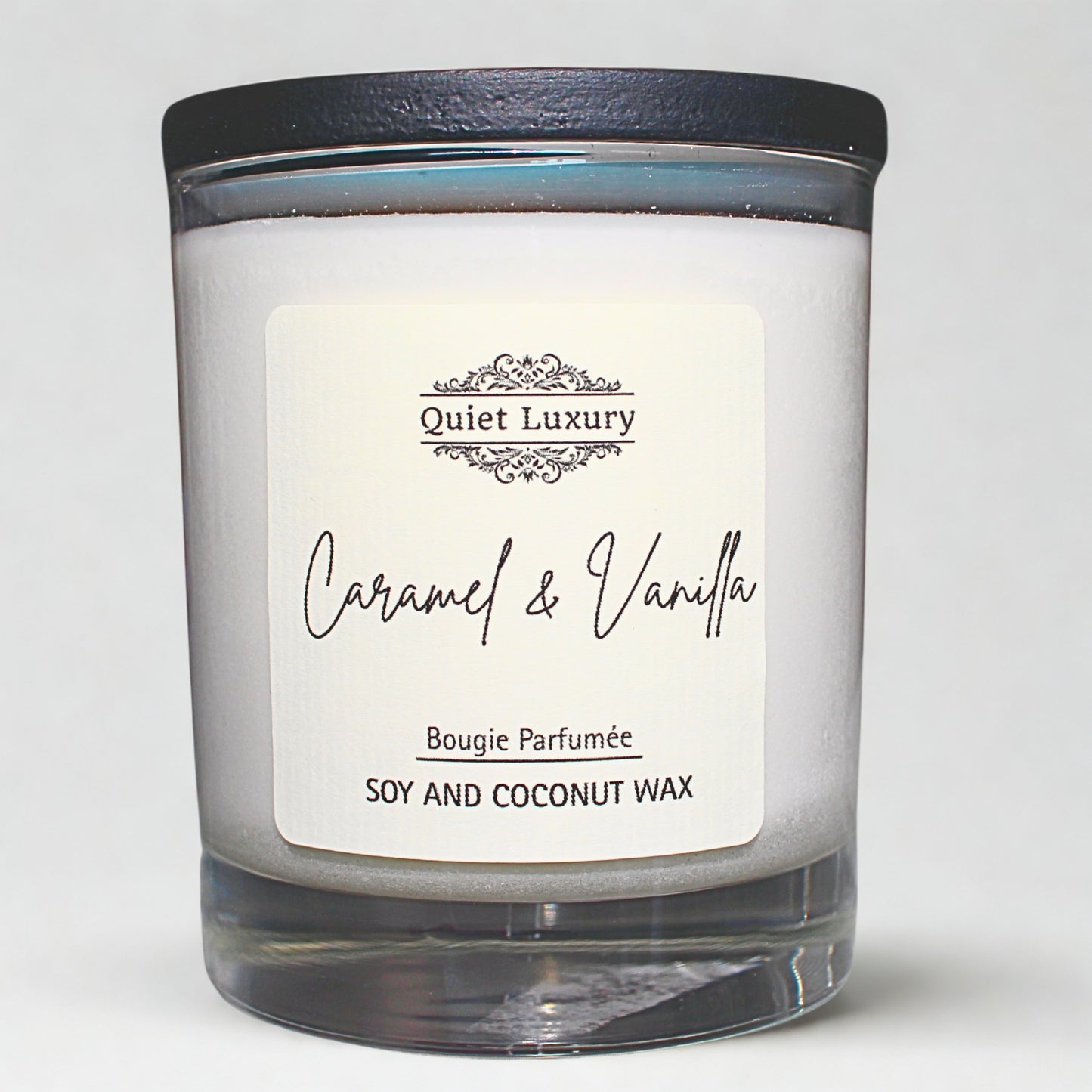 Caramel and vanilla soy Candle with a 'Quiet Luxury' label on a white background