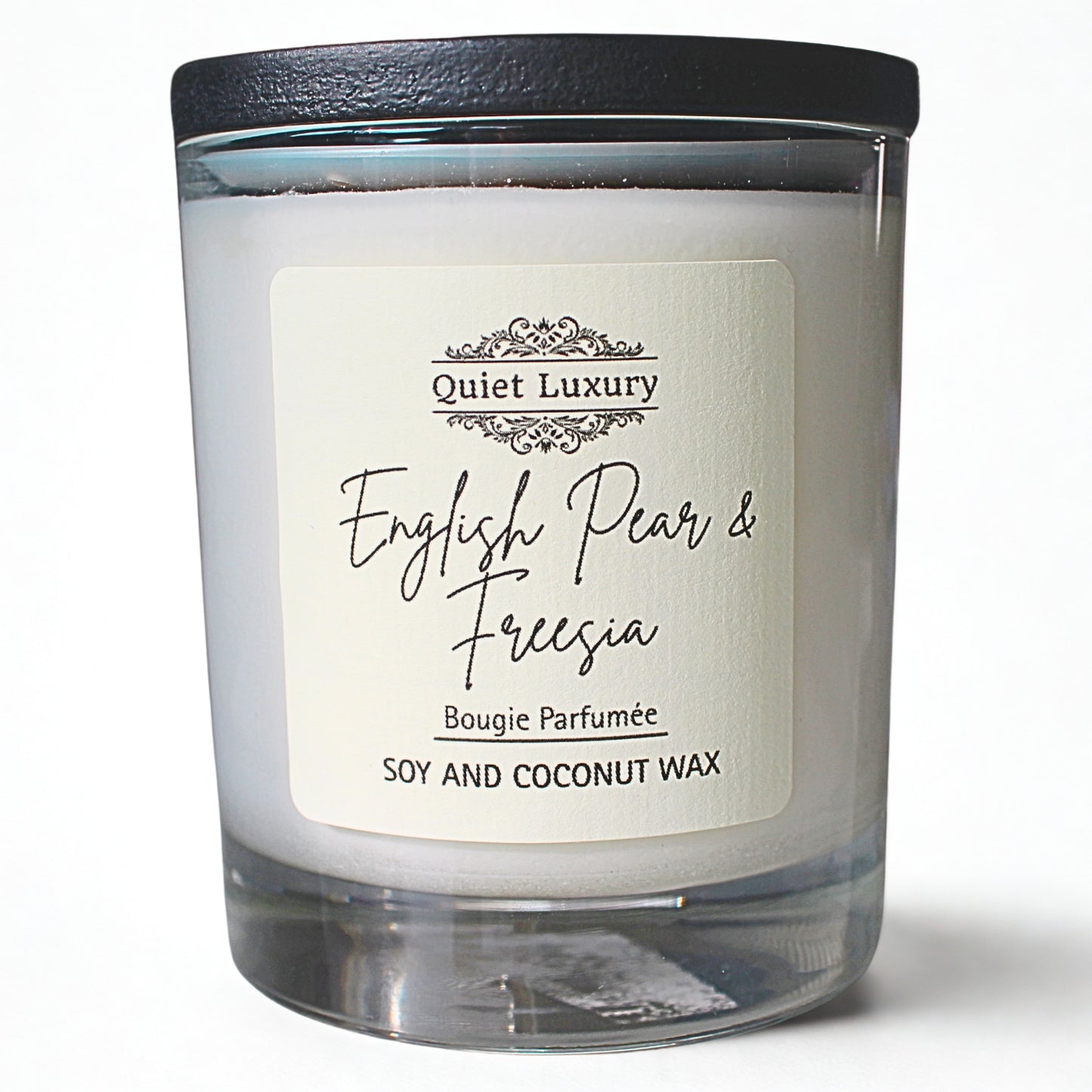 English Pear and Freesia luxury Candle with 'Quiet Luxury' label on a white background