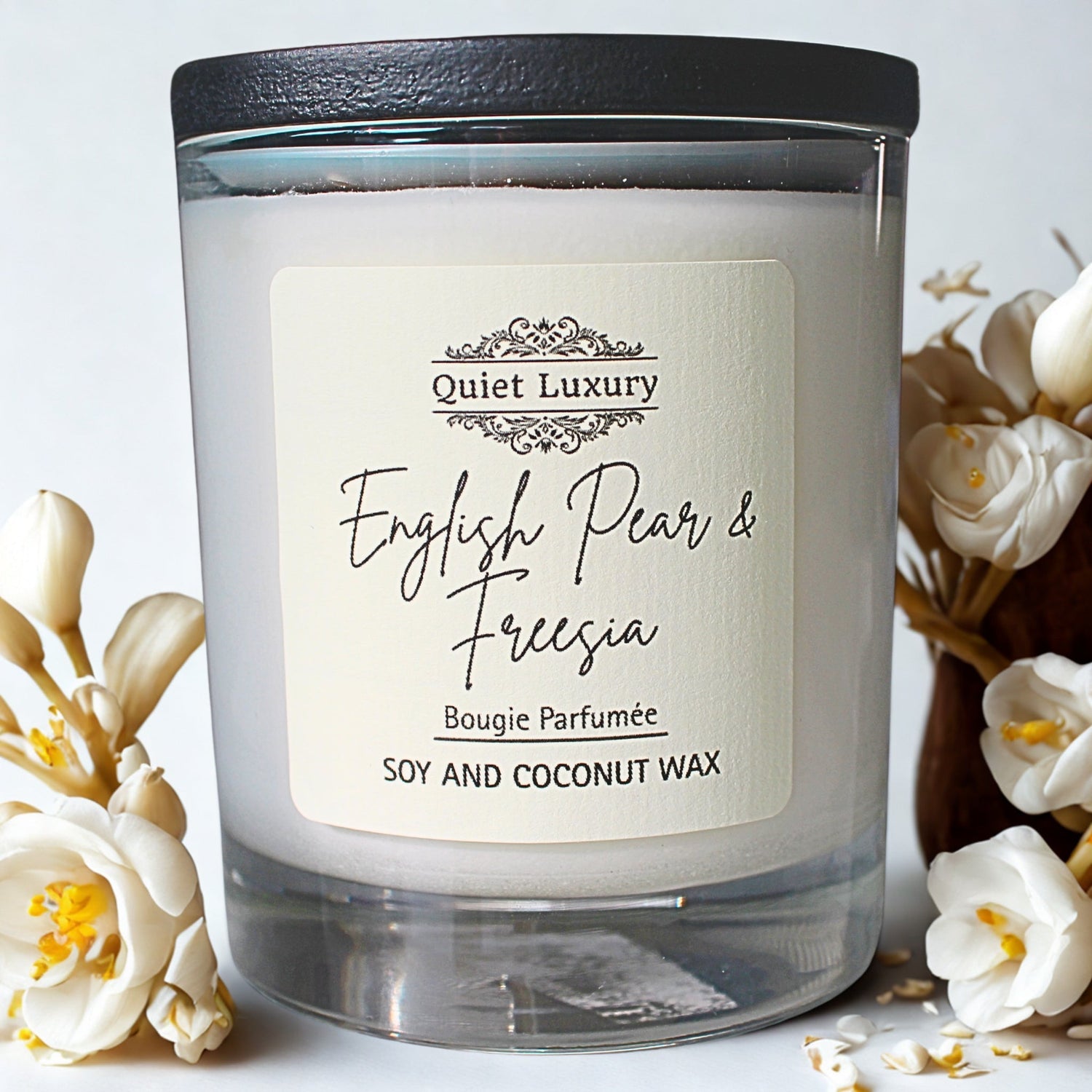 English Pear and Freesia scented soy and coconut wax candle with white flowers