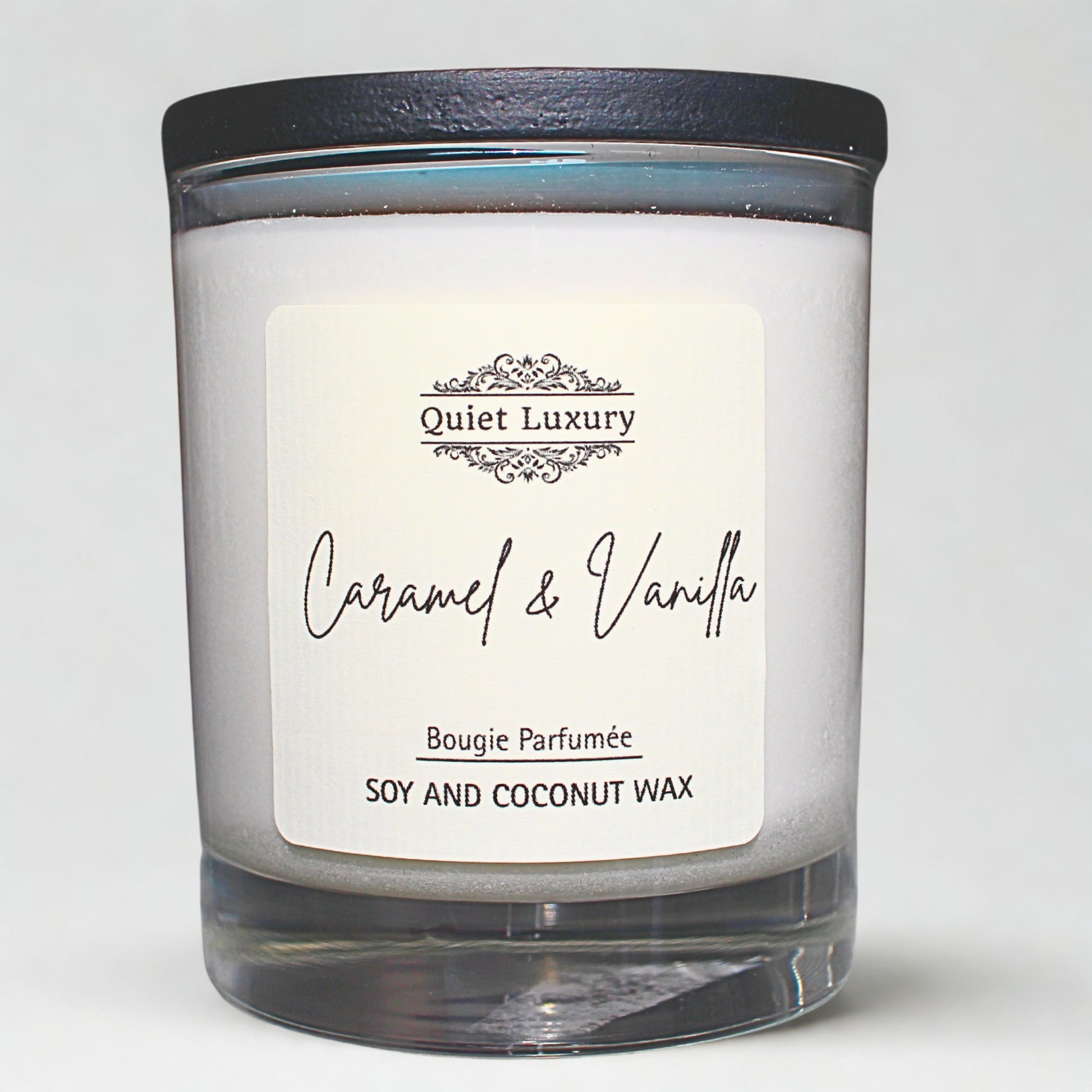 Caramel and vanilla soy Candle with a 'Quiet Luxury' label on a white background