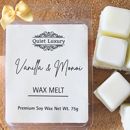 Vanilla and Monoi luxury soy wax melt pack with white wax cubes and a yellow bow